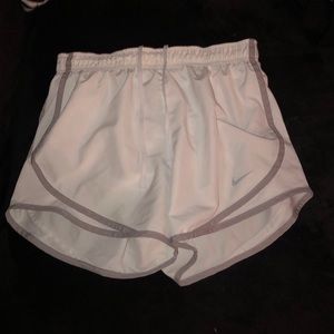 white nike athletic shorts with gray